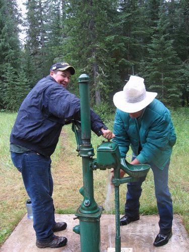 Dad and Greg cleaning up for lunch.jpg
